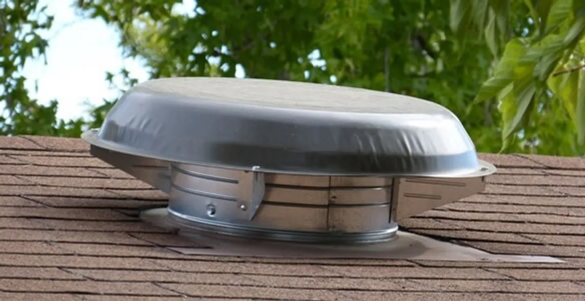 attic fan installation services with low-profile roof ventilation unit in West Palm Beach, FL