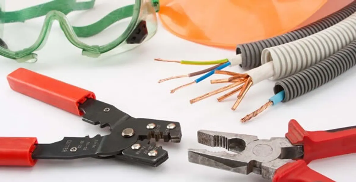 Electrical wiring repair with professional tools and safety equipment in Jupiter, FL