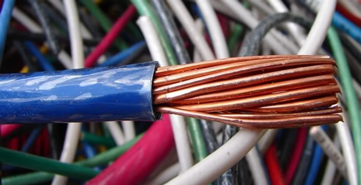 electrical wiring services showing exposed copper conductors and cable preparation in West Palm Beach, FL
