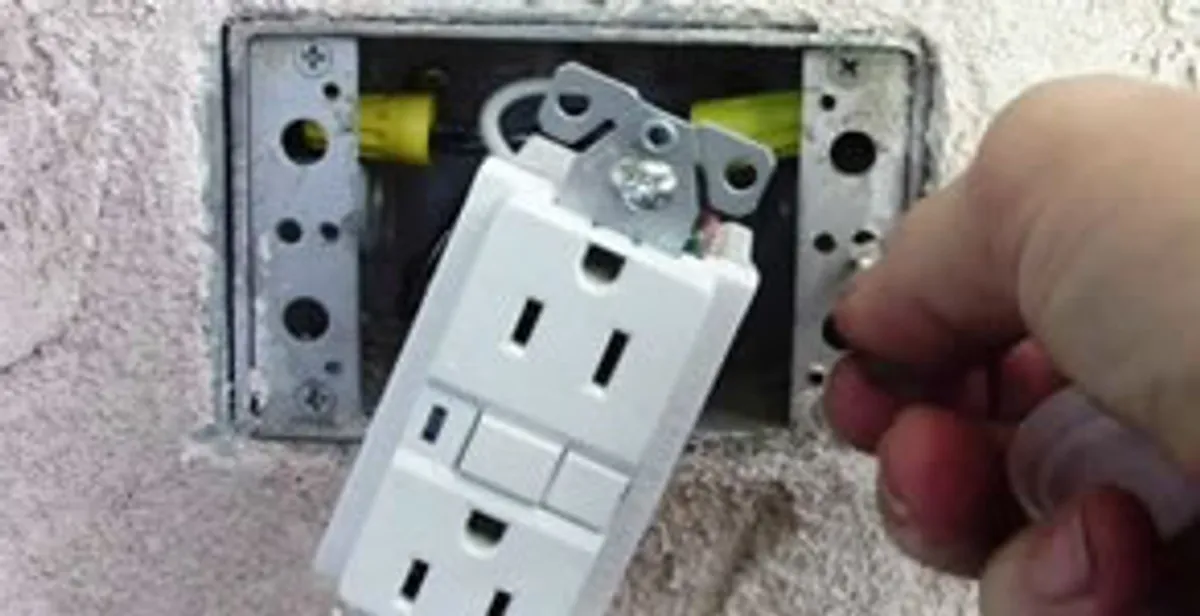 gfci circuits service showing installation of a ground fault circuit interrupter outlet by licensed electricians in West Palm Beach, FL