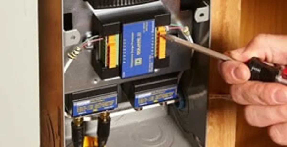 Whole home surge protection device being installed by a licensed electrician to protect electrical systems in West Palm Beach, FL